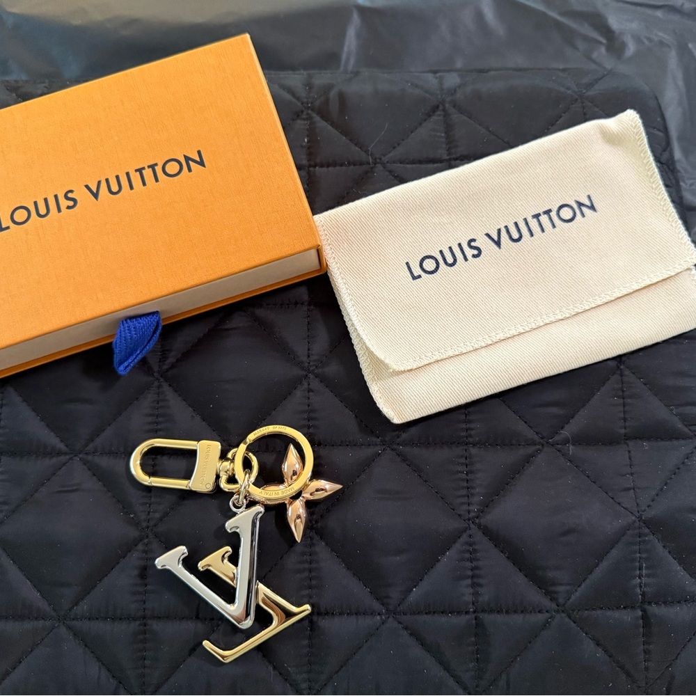 Authentic Louis Vuitton New Wave Bag Charm Key Chain. NEW w/box and dust bag.
